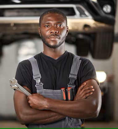 professional-black-auto-mechanic-looking-camera_183219-2505